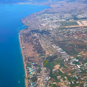 Aerial photograph of Lara beach and Antalya bay in background