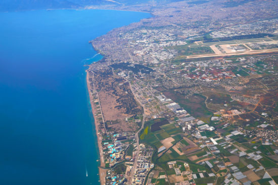 Aerial photograph of Lara beach and Antalya bay in background